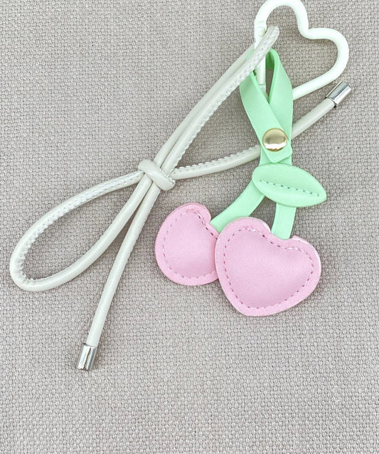 Accessoire de sac cerise rose